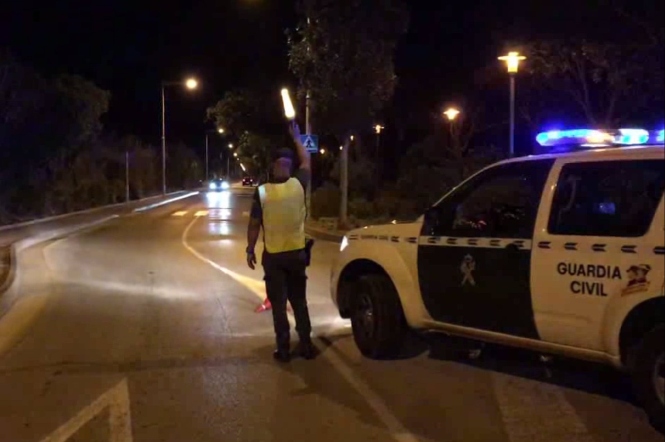 Un agente de la Guardia Civil, en un control (GUARDIA CIVIL) 