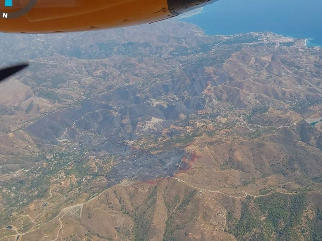 Vista aérea de la zona afectada por el incendio de Almuñécar, el pasado miércoles (PERFIL DEL INFOCA EN LA RED SOCIAL X)